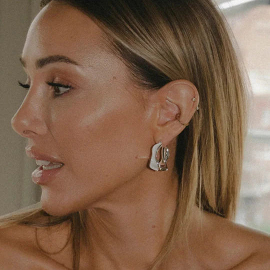 White detailed earring