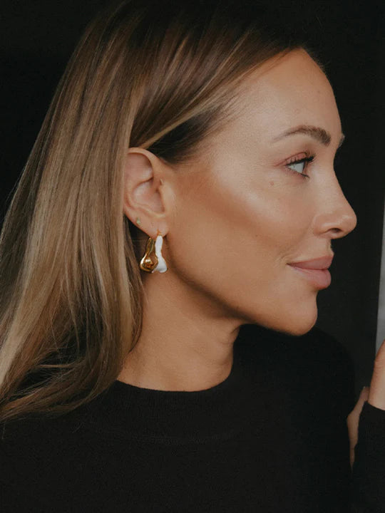 White detailed earring